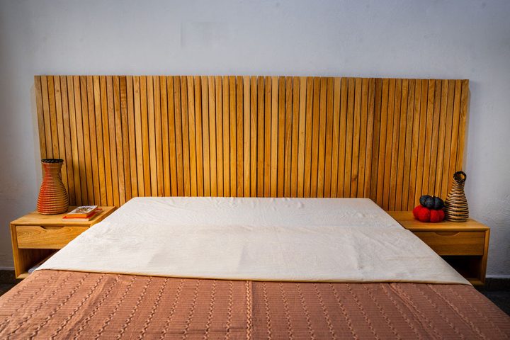 Wide Slatted-Headboard Bed
